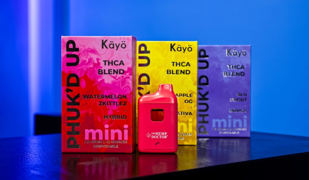 Kayō PHUK’D UP THCa Blend Disposables by The Hemp Doctor in flavors like Watermelon Zkittlez, Apple OG, and Blu Razz, on display at Carolina Cloudz.